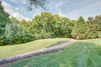 This home uniquely offers both front and back views of the signature Governor's Club Arnold Palmer golf course. An abundance of trees provide beautiful scenery.