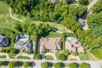 Located along Governors Way, the main concourse in the Governors Club, this home sits on one of the original select few estate lots in the neighborhood.  It offers a unique geothermal hvac system and excellent security.