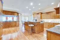 Cabinet-covered appliances included in this truly high-end, custom kitchen.