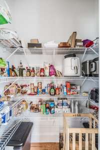 Large, walk in pantry offers lots of storage~
