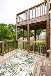 Large deck is perfect place to enjoy the private backyard!