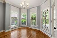 Breakfast nook with views into the back yard.