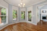 Breakfast nook off the kitchen, back door leads to the private covered patio.