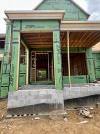 Front Covered Porch * this home is under construction. Photo taken 6/22/25