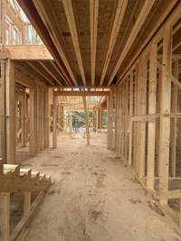 Elegant Foyer. Where first impressions areas are grand as the space itself. *this house is under construction. Photo taken 6/5/25