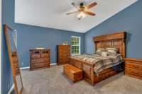 Incredibly spacious Primary Bedroom with vaulted ceiling.