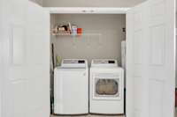 Laundry closet is located off the Kitchen. Washer and dryer remain.