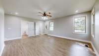 Primary bedroom with full bathoom and walk-in closet.