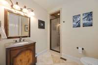 Full bathroom down accessible from both the foyer read and the 2nd downstairs bedroom.
