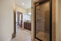 It's a shared bathroom, but quite upscale for a Jack and Jill!