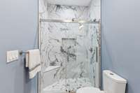 Bedroom 2 tiled shower