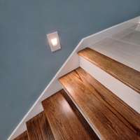 The upgraded hardwood stair treads and railing add a touch of sophistication and lighting for safety for your family