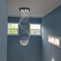 Foyer chandelier to fit this open space.  Also, extra windows for natural light