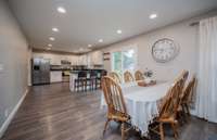 There is so much room in the kitchen. Spacious eat-in area can hold a rather large dining table with multiple configuration options.