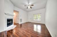 The living area features a cozy gas fireplace, adding warmth and charm.