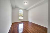 Bedroom #1 is generously sized with beautiful ceiling details along with a large closet for ample storage.