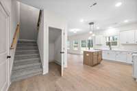 **Photos are examples of a previous build with the exact plan.**