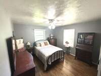 Bedroom #2. Look at those hardwood floors!!
