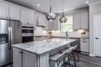 Quartz countertops are included in all of our homes!