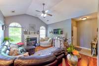 Large living room with a gas log fireplace.