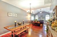 Dining room is conveniently situated between the kitchen and living room.