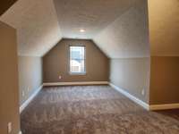 Spacious 4th Bedroom/Bonus Room Upstairs.  Picture of Previous House.