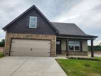 Welcome Friends and Family on Your Covered Front Porch in Valley Farms! Picture of Previous House.