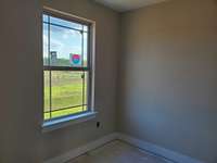 Owner's Bedroom has Extra Wall Space and a Walk-In Closet. Picture of Similar House.
