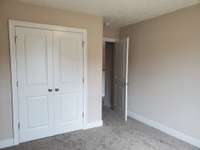 Second Bedroom Upstairs with Double Door Closet.  Picture of Similar House.