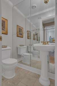 Powder room with pedestal sink.