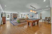 The expansive Great Room offers hardwired speakers for surround sound. This space is large enough for home theater nights and space for billiards—perfect for entertaining.