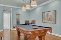 The pool table, cues, and wall rack are available for purchase on a separate bill of sale.