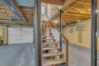The basement of this home is fantastic.. it offers a walk out pedestrian door and garage with electric vehicle charging capabilities.