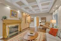 Note the intricate wood surround and mantel with dental molding.