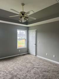 Master Bedroom with Trey Ceiling and walk-in closet and Full Bath