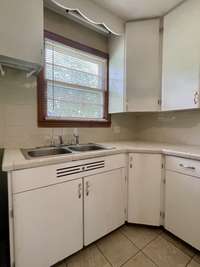 Step back in time & embrace the charm of this 1952 kitchen, w/ original Built-Well cabinets. These classic cabinets provide a sense of nostalgia and authenticity, making the kitchen a delightful blend of vintage style and practical functionality.