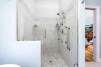 Primary Bath, 5 Nozzle Shower, Tile and built in Bench.