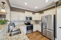 Stainless steel appliances and white cabinetry offer both style and functionality. 1107 Sycamore Leaf Way   Murfreesboro, TN 37129
