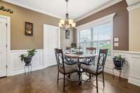 Just off the kitchen, the eat-in area features a large window and charming wainscoting, creating an inviting space for meals.1107 Sycamore Leaf Way   Murfreesboro, TN 37129