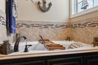 A beautiful soaking bathtub provides the perfect place to unwind. 1107 Sycamore Leaf Way   Murfreesboro, TN 37129