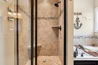 The stand-alone glass shower adds a sleek, modern touch to the space. 1107 Sycamore Leaf Way   Murfreesboro, TN 37129