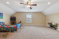 The carpeted bonus room features vaulted ceilings and recessed lighting, creating a bright and airy atmosphere. 1107 Sycamore Leaf Way   Murfreesboro, TN 37129