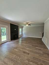 spacious living room with fireplace