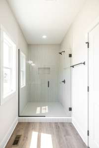 Huge 5 ft walk in shower with upgraded tile!