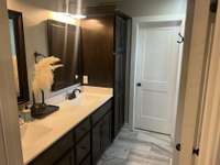 Double vanity sink view of bathroom tile
