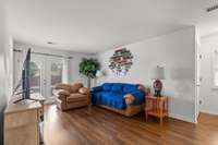 Living Room - A much more expansive view!  This room leads to a private patio where the hot tub awaits you!