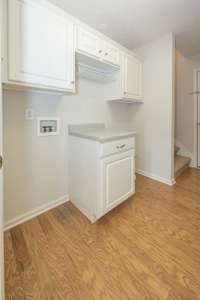 Utility room with cabinets for storage