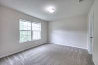 One of four upstairs bedrooms.