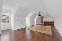 555' of space in this massive bonus room!  Projection system to remain!