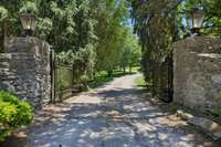 Gated Entrance & Historic Stone Wall